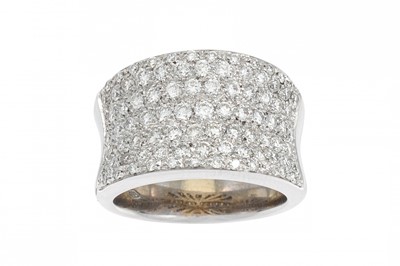 Lot 275 - A DIAMOND RING, the pavé set brilliant cut...