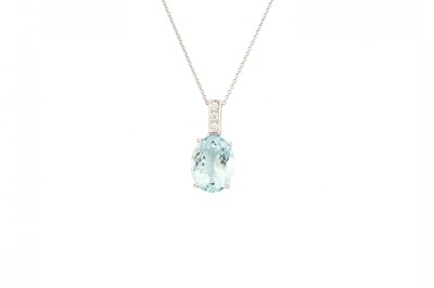 Lot 286 - AN AQUAMARINE AND DIAMOND PENDANT, the oval...