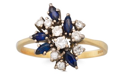 Lot 324 - A DIAMOND AND SAPPHIRE DRESS RING, mounted in...