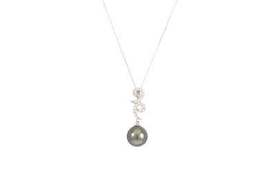 Lot 28 - A DIAMOND AND BLACK PEARL PENDANT, the shaped...