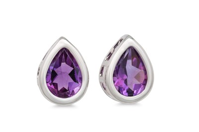 Lot 19 - A PAIR OF AMETHYST  SET EARRINGS, the pear...