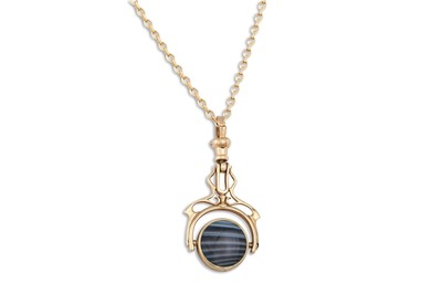 Lot 25 - A 9CT GOLD SWIVEL SEAL PENDANT, on a chain