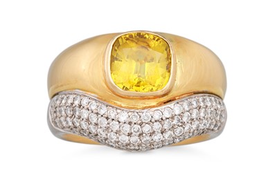 Lot 270 - A YELLOW SAPPHIRE AND DIAMOND RING, the...