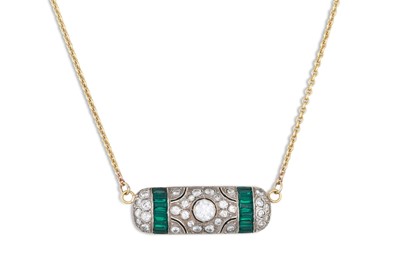 Lot 271 - AN ART DECO DIAMOND AND EMERALD PENDANT, the...
