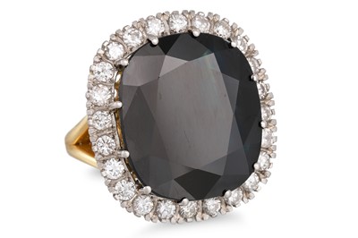 Lot 293 - A SAPPHIRE AND DIAMOND CLUSTER RING, the oval...