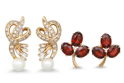 Lot 315 - A PAIR OF GARNET CLUSTER EARRINGS, mounted in...