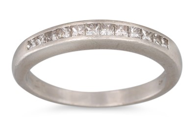 Lot 316 - A DIAMOND HALF ETERNITY RING, channel set with...