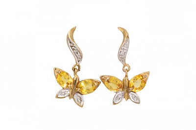 Lot 102 - A PAIR OF CITRINE DROP EARRINGS, modelled as...