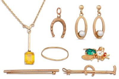 Lot 51 - THREE GOLD BROOCHES, together with a pendant,...