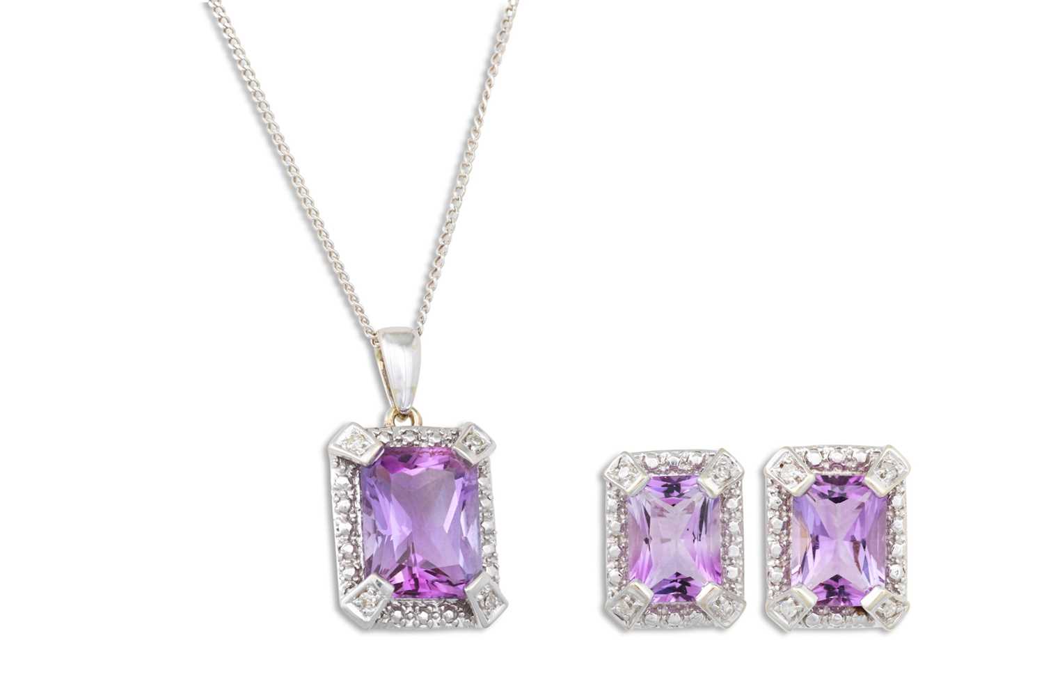 Lot 22 - A DIAMOND AND AMETHYST PENDANT, the princess...