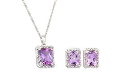 Lot 22 - A DIAMOND AND AMETHYST PENDANT, the princess...