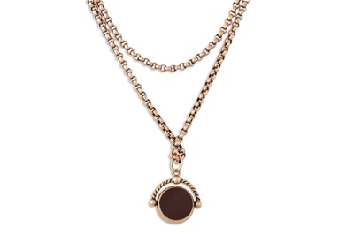 Lot 24 - AN ANTIQUE GOLD MUFF CHAIN, suspending a...