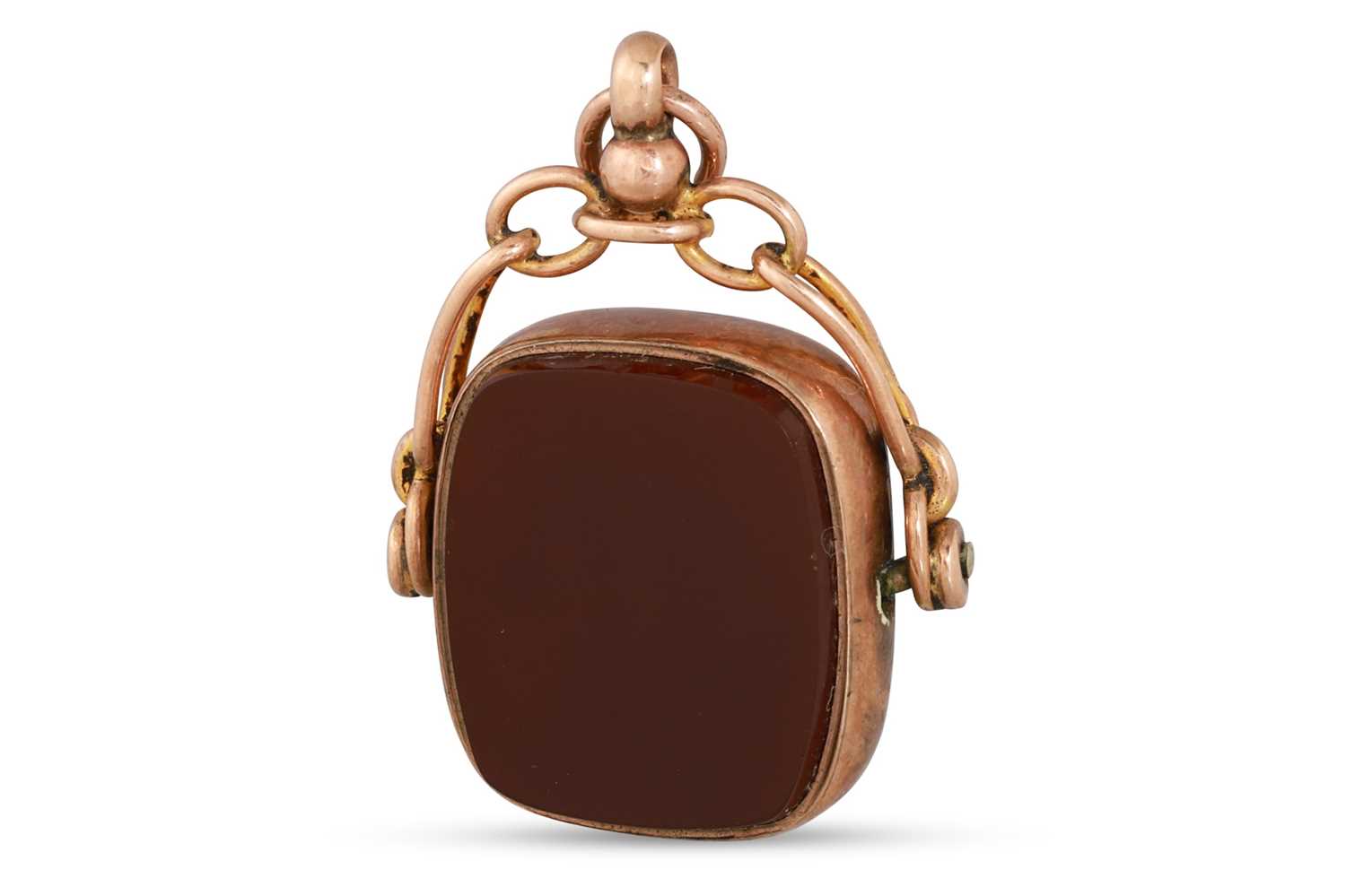 Lot 67 - A 9CT GOLD SWIVEL SEAL, carnelian and...