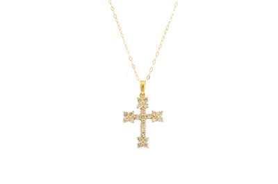 Lot 179 - A DIAMOND SET CROSS, the brilliant cut...