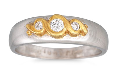 Lot 147 - A THREE STONE DIAMOND RING, mounted in 18ct...