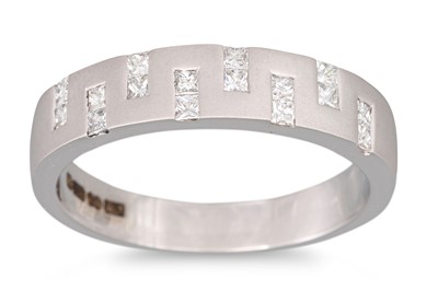 Lot 149 - A DIAMOND HALF ETERNITY RING, of contemporary...