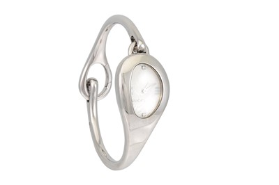 Lot 182 - A LADY'S GUCCI BANGLE WATCH, mother-of-pearl...