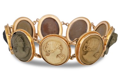 Lot 12 - AN ANTIQUE LAVA CAMEO BRACELET, comprising...