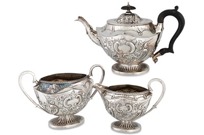 Lot 384 - A THREE PIECE VICTORIAN TEA SERVICE, chaised &...