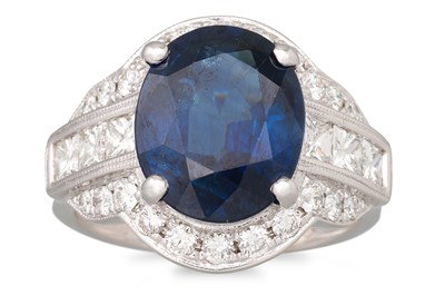 Lot 172 - A SAPPHIRE AND DIAMOND RING, the oval sapphire...