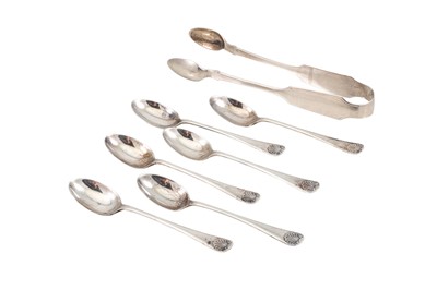 Lot 473 - A IRISH SILVER TONGS, Dublin 1869, with a set...
