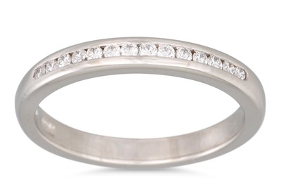 Lot 192 - A DIAMOND HALF ETERNITY RING, the channel set...