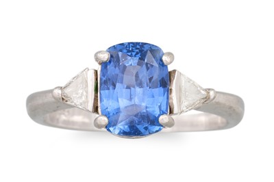 Lot 285 - A SAPPHIRE AND DIAMOND THREE STONE RING, the...