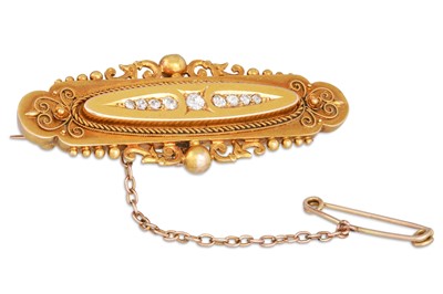 Lot 169 - A VINTAGE 15CT GOLD DIAMOND SET BROOCH, with...
