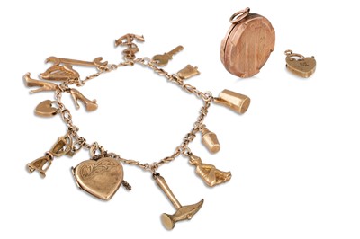 Lot 60 - A 9CT GOLD CHARM BRACELET, various charms...