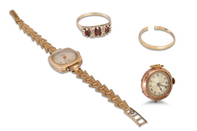 Lot 69 - TWO VINTAGE GOLD WATCH HEADS, a garnet set...