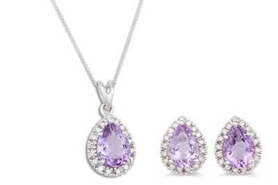 Lot 33 - A DIAMOND AND AMETHYST PENDANT, the pear...