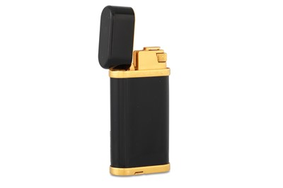 Lot 35 - A CARTIER ENAMEL LIGHTER, gilt mounts