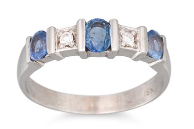 Lot 39 - A DIAMOND AND TANZANITE FIVE STONE RING, the...