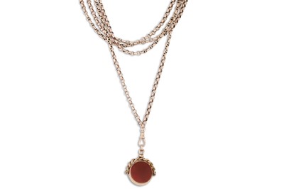 Lot 83 - AN ANTIQUE GOLD MUFF CHAIN, suspending a gold...