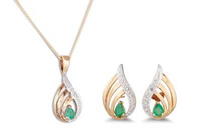 Lot 84 - AN EMERALD AND DIAMOND CLUSTER PENDANT, pear...
