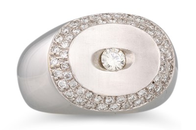 Lot 56 - A DIAMOND RING, of bombé form, the central...