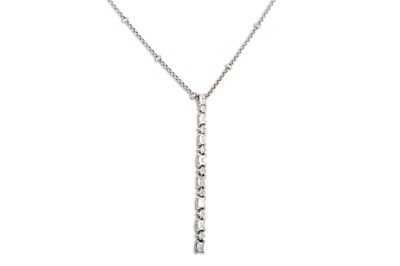 Lot 279 - A DIAMOND SET PENDANT, set with a line of...