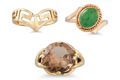 Lot 137 - A TOPAZ RING, mounted in 10ct gold, size M,...