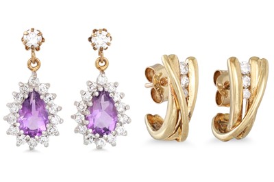Lot 148 - A PAIR OF CUBIC ZIRCONIA CROSSOVER EARRINGS,...