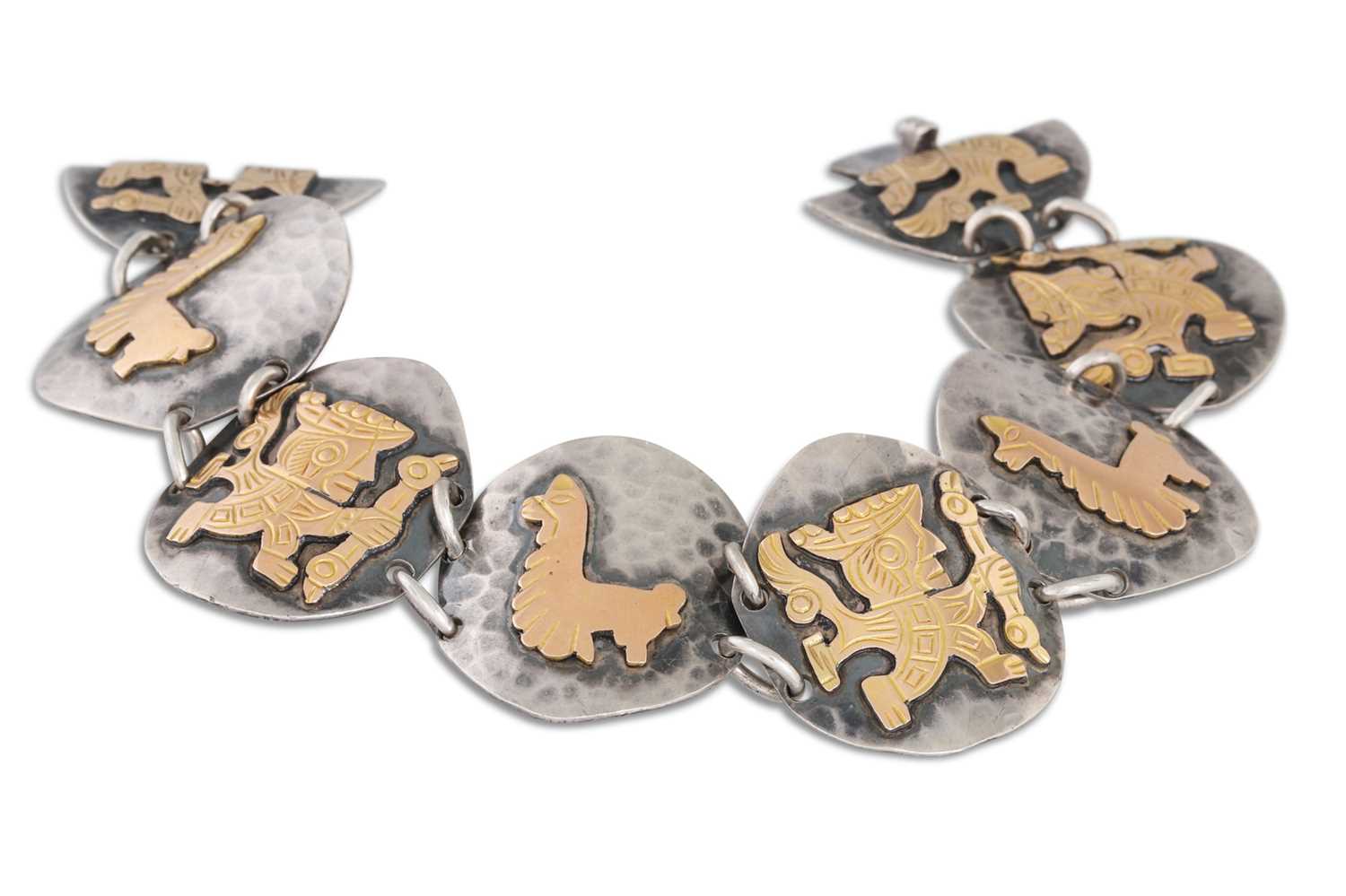 Lot 6 - A PERUVIAN BRACELET, silver with 18ct plated...