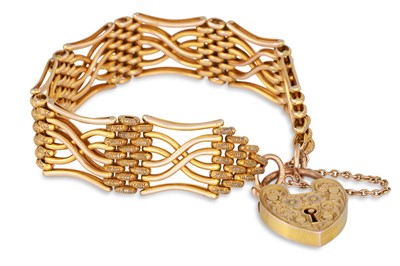 Lot 20 - A 9CT GOLD GATE BRACELET, with padlock,...