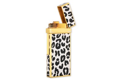 Lot 25 - A YVES SAINT LAURENT ENAMEL LIGHTER, black &...