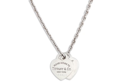 Lot 67 - A SILVER TIFFANY PENDANT, stamped 'I Love you,...