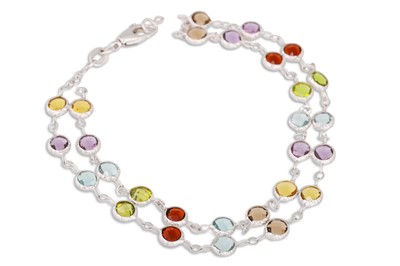 Lot 68 - A TWO ROWED MULTI GEM - SET BRACELET, the...