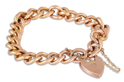 Lot 75 - AN ANTIQUE 9CT GOLD CURB BRACELET, with...