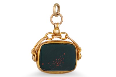 Lot 81 - AN ANTIQUE 9CT GOLD SWIVEL SEAL, set with...