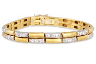 Lot 53 - A DIAMOND SET PANEL BRACELET, the alternating...
