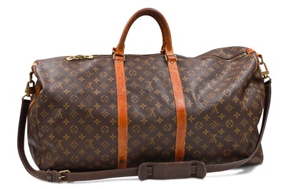 Lot 196 - A VINTAGE LOUIS VUITTON KEEP ALL CANVAS BAG,...