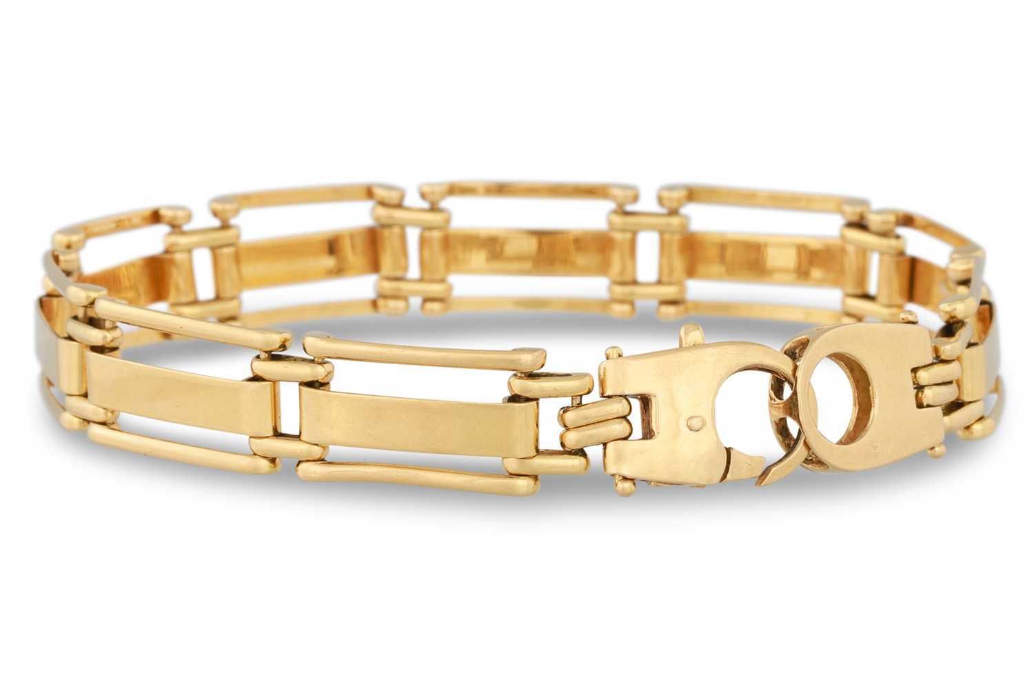 Lot 77 - AN 18CT YELLOW GOLD PANEL BRACELET, stylised...