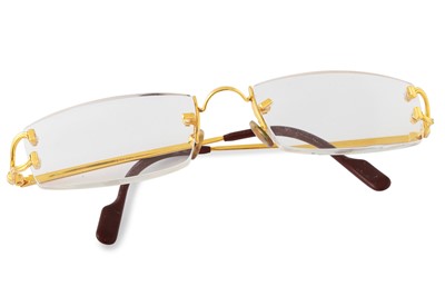 Lot 185 - A PAIR OF CARTIER READING GLASSES, framed, box...